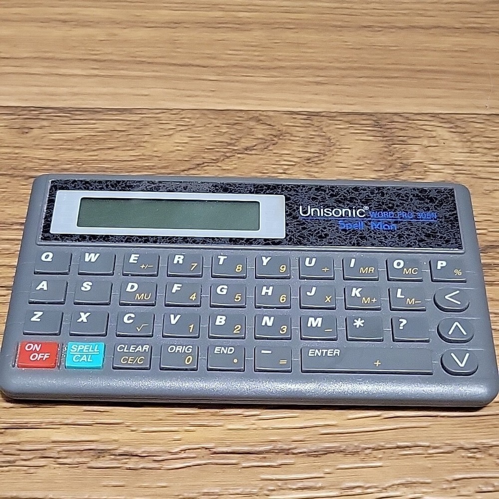 Unisonic Word Pro 305N Spell Man 1989 Mini computer Calculator Dictionary